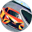 A red and yellow sports car drifting around a sharp corner on a racetrack.